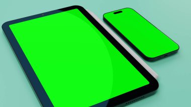 Yüzeyinde boş yeşil ekran görüntüsü olan tablet ve akıllı telefon. Yüksek kalite fotoğraf