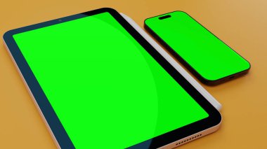 Yüzeyinde boş yeşil ekran görüntüsü olan tablet ve akıllı telefon. Yüksek kalite fotoğraf