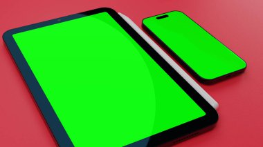 Yüzeyinde boş yeşil ekran görüntüsü olan tablet ve akıllı telefon. Yüksek kalite fotoğraf