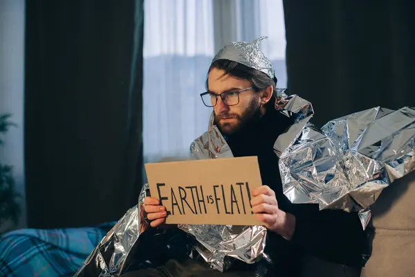 Conspiracy Theory Man Wrapped Foil Blanket Holds Sign Inscription — Stock Photo, Image
