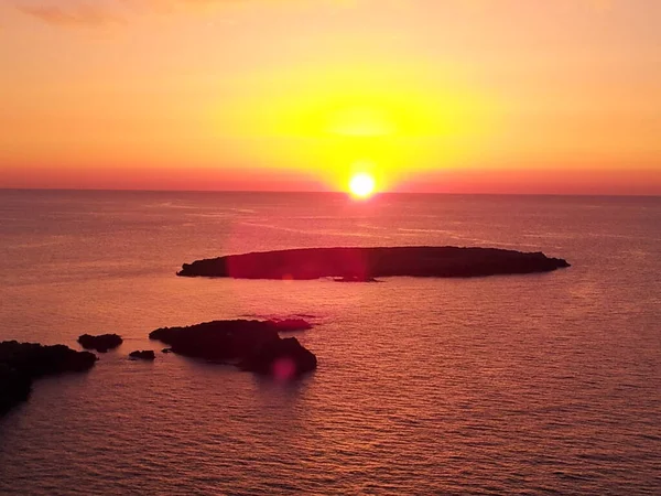 Sunset at the lighthouse of Cape Nati, Menorca