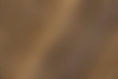 Çapraz bantlı ocher renklerinin bulanık arkaplanı.