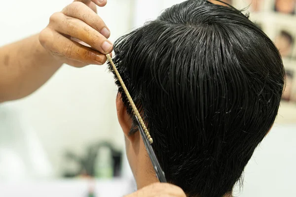 hair cut in barbershop asian people