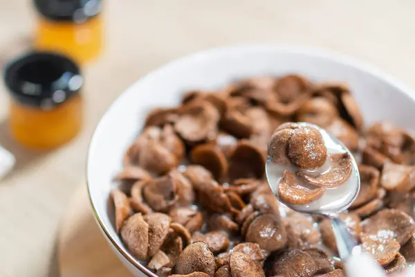 Sweet chocolate breakfast cereal flakes.