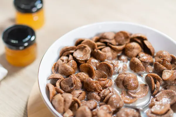 Sweet chocolate breakfast cereal flakes.