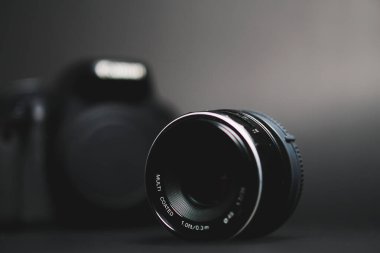 lens camera with a lens on the table
