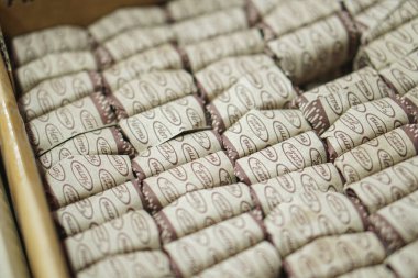 chocolate and coffee beans in a white bag