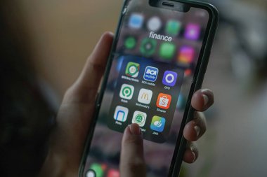 mobile phone in the hands of a woman