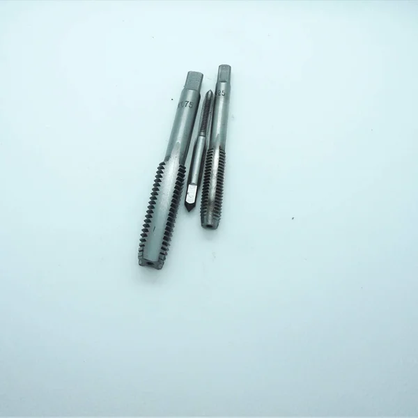 Hand tap (threading tool Warwick) in white isolated background.
