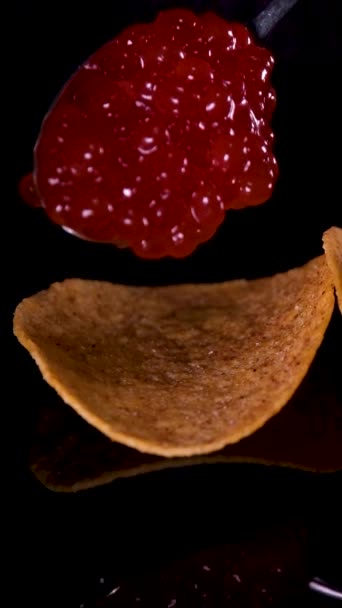 Serve Spoonful Red Caviar Chips Black Background Beautiful Serving Expensive — Stock Video