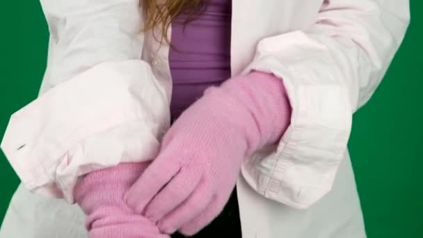 Young Woman Putting Warm Winter Gloves Straightening Shirt Sleeves French — Stock Video