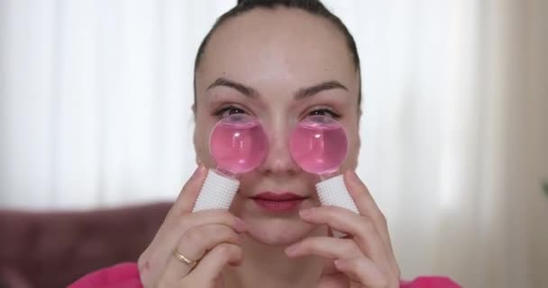 Woman Massaging Her Face Cooling Face Rollers Ice Globes Facial — Stock Video