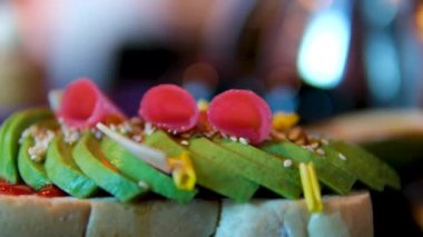 Healthy avocado toast with salad on plate. Sesame and flax seeds. Vegetarian food. High quality 4k footage