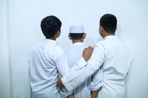 stock image A group of Asian Muslim boys are talking together