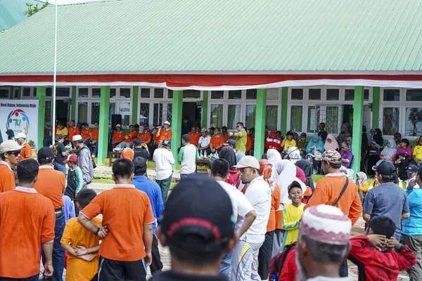 stock image Indonesia, Makassar, 06 September 2024. People are listening to a speech in the field