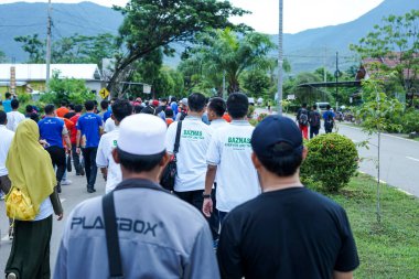 Indonesia, Makassar, 06 September 2024. Residents took a leisurely walk clipart