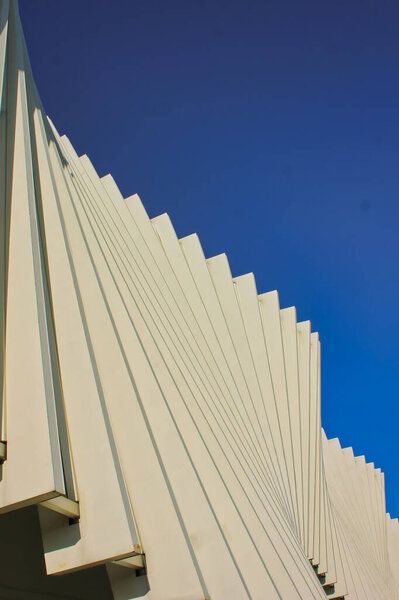 Waves and lines in an outside view of the railway station of Reggio Emilia