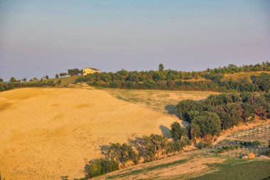 Charming view of the countryside from the top of the mountain, at the sunset.