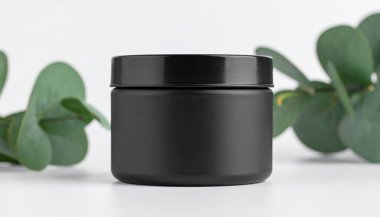 Siyah Matte Dairesel Tin Jar Mockup ve Yeşillik