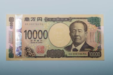 Taipei, Tayvan-20 Ocak 2025 Japon 10 bin yen 'i bir tarafta.