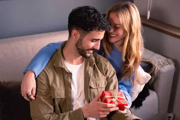 Young Woman Smiling Happy Giving Gift Box Touching Her Boyfriends — Stock Photo, Image