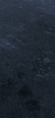 Yüksek çözünürlüklü arkaplan resmi koyu lacivert desenli hafif grunge efektli bir yüzey tasarım, üstüste dizayn, yaratıcı projeler ve sunumlar için mükemmel