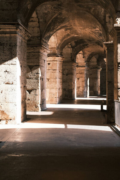 Wander the enigmatic corridors of the Colosseum, where history's whispers can almost be heard in the hushed atmosphere. These passageways in Rome's iconic structure are a bridge to an era of emperors and gladiators.