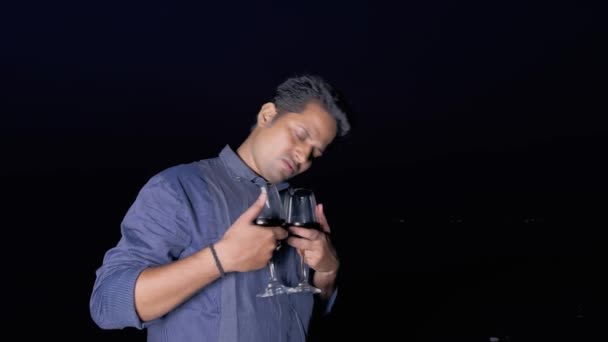 Drunk Man Holding Two Wine Glasses Talking Himself Dark Night — Stock Video