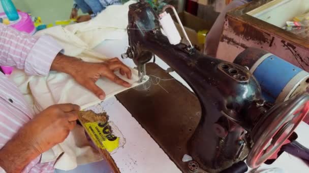 Closeup Tailor Man Hands Working Sewing Machine Fabric Thread Visible — Stock Video