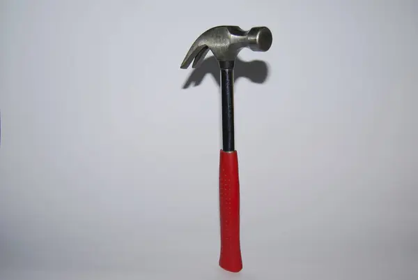 Hammer with nail puller. Hand tool.