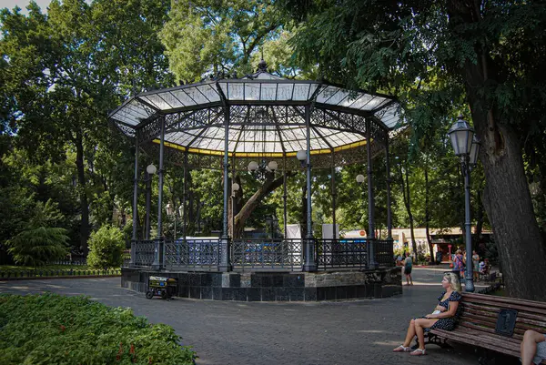 stock image Odessa, Ukraine - 07.13.2024:  City garden in Odessa.In the center of Odessa, on Deribasovskaya Street, in the city garden there is a gazebo.