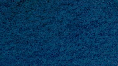 Sandy, mavi rengin dekoratif yüzeyi. Kumu andıran mavi yüzey..