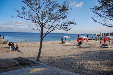 Odessa beaches on a sunny autumn day.Sunny day, lots of people relaxing. The last warm days. clipart