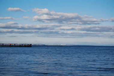 Odessa Bay of the Black Sea. Langeron Beach, on the Black Sea coast. The coast is visible in the distance - the village of Kotovsky is located there. clipart