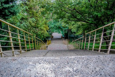 The old concrete stairs provide access to the beaches of Odessa.The old long stairs are still used to access the beaches of Odessa, some of them are partially repaired. clipart