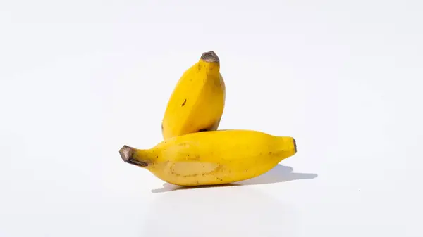 Açık Sarı Muzlar Minimalist Beyaz Yüzeyde Gösterildi