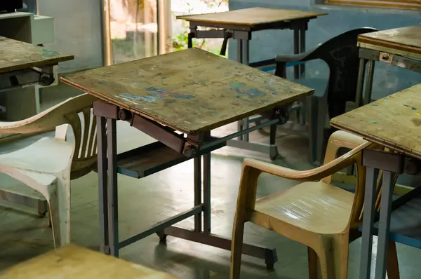 Simple art classroom with plastic chairs