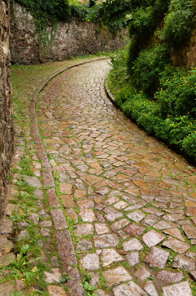 Historical cobble stone laid narrow street in Meissen, Germany