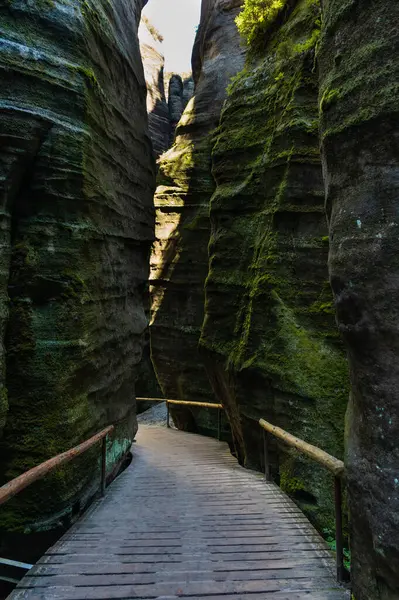 Hiking path through monumental rock formations in Adrspach rocks, Czech Republic