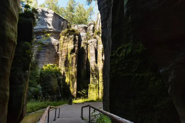 Hiking path through monumental rock formations in Adrspach rocks, Czech Republic