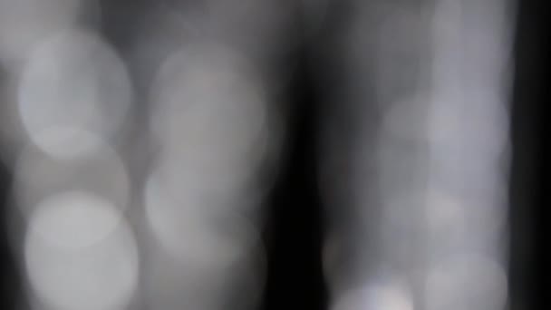 Siyah Arkaplan Üzerinde Dönen Cam Işık Yansımaları — Stok video