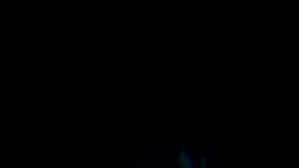 Скляна Світлова Лінза Витікає Чорному Фоні — стокове відео