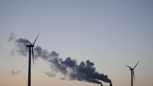 Wind Turbines Silhouette Factory Smoke Stack Clear Sky Dusk — Stock Video