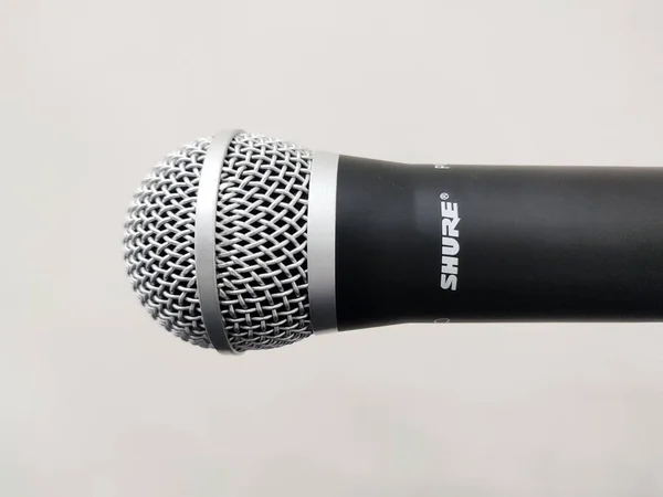 stock image Shure wireless microphone isolated on a white background, Surakarta, Indonesia - December 9, 2023