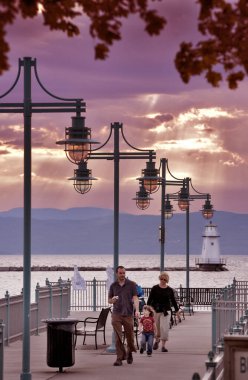 Burlington, VT Lighthouse. Lake Champlain is the next largest lake after the Great Lakes.  It is 115 miles long, 15 miles wide and about 400 feet deep.  Upstate NY and the Adirondacks borders the west and Vermont and the Green Mountains borders the e clipart