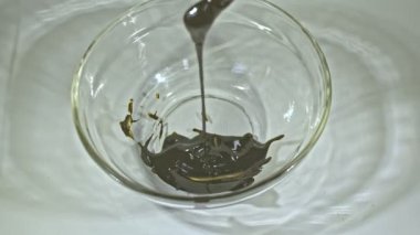 .Using heat to simmer cannabis buds to stimulate cannabinoids. Use a glass rod to stir the cannabis oil..Hemp oil color is dark brown and sticky..hemp oil extraction. Herbs with great benefits