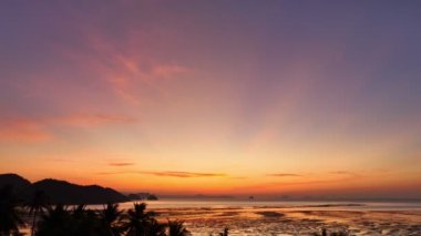 Aerial view of Laem Had Beach in Koh Yao Yai, island in the andaman sea between Phuket and Krabi Thailand.Aerial view stunning sky at sunrise above coconut trees.Landscape with tropical.