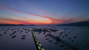 aerial view Chalong gulf in colorful of twilight. first light above archipelago in chalong gulf Phuket thailand.4k stock footage video in travel concept.