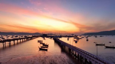 aerial view Chalong gulf in colorful of twilight. first light above archipelago in chalong gulf Phuket thailand.4k stock footage video in travel concept.