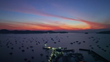 aerial view Chalong gulf in colorful of twilight. first light above archipelago in chalong gulf Phuket thailand.4k stock footage video in travel concept.